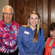 Vice President Chuck Veltrie, Devin Defendis from New Life Center and Frankie Veltrie, Social Committee at the PC Democratic Club February meeting; Photo by Phil Korzilius.