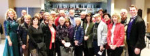 Members of the PC Democratic Club join cast members Beatrice Crosbie (playing Milo Davenport) and Michael Brennan (playing Henri Baurel) from An American in Paris at the Arizona Broadway Theater.