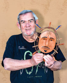 Dale Sevig with mask in the Yup’ik tradition.