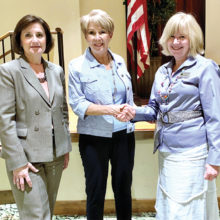Councilwoman Laura Kaino and Economic Development Director Laura Gary are welcomed By PebbleCreek Singles Club President Judy Maloney.