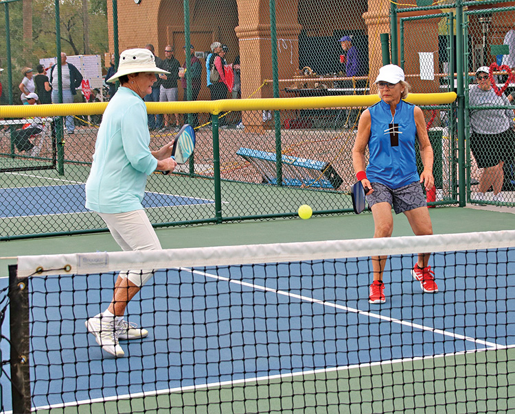 Sheri Sears and Darlene Walker showed patience in covering the middle of the court; Photo by Dannie Cortez.