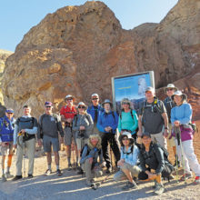 Hikers at the trailhead of Golden Canyon were doing the Golden Valley, Zabriskie Point, Gower Gulch Loop. From left to right in front: Cheryl, Susan and Pat; in the rear: Lynn, Tom, Gary, George, Linda, Wayne, Pam, Nancy, Roger, Dana and Susan.
