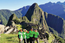 Left to right: Lynn Warren, Julie Walmsley, Marilyn Reynolds, Diana Bedwell and Dave “Ausy” Ausman paused for a photo op after a 26-mile trek to iconic Machu Picchu.