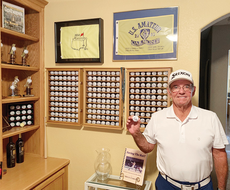 Bruce Carlyle displays mementos of shooting his age or better 210 times.
