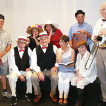 Cast members include (left to right): John Fuhrmann (Marcellus), Dan Baker and Ray Hadden (school board Members), Donna Prinz and Shotzie Workman (Pick-A-Littles), Nancy Davis (Marian), Susie Moy (Winthrop), Chuck Kelly (anvil salesman), and Jack Coate (Professor Hill).