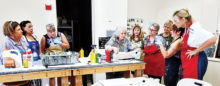 Some of the participants in the Aug. 8 Acrylic Pour Painting 101 class.