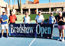 Lots of planning goes into the Bradshaw Tournament. Shown holding the banner are Len Vogelaar, Jerry Higgins, Judy Grefsheim, Al Wagner (past co-chairman), Linda Vogelaar, and CTC President Mary Ann Rice.