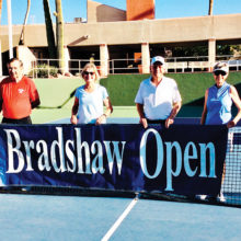 Lots of planning goes into the Bradshaw Tournament. Shown holding the banner are Len Vogelaar, Jerry Higgins, Judy Grefsheim, Al Wagner (past co-chairman), Linda Vogelaar, and CTC President Mary Ann Rice.