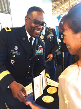 The Congressional Gold Medals were presented by Brigadier General Bruce C. R. Linton.