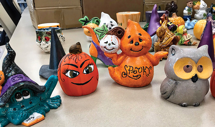 Ornaments (witches, ghosts, pumpkins, and so on) were presented to the children.