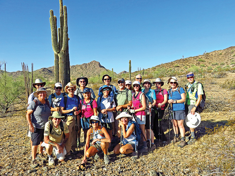 Enjoying the hike were, (kneeling in front, left to right): "London," Laurie, and Eileen. Standing: Rene, Jim, Dave, Pete, Wayne, Marilyn (hike leader), Barb, Wayne, Leon, Linda, Sandy, Dennis, Charlene, Pam, Linda, and Lynn (photographer), Alex missed the photo shoot.