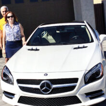 Featured owner Pat Chaback with her husband and her 2016 SL 550.