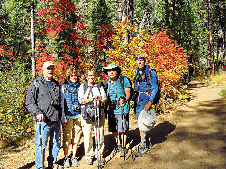 Left to right: Jim Frey, Susan Bernt, Adriana Greisman, Glenn Ishibashi, and Lynn Warren (photographer) pausing for a quick group photo in front of impressive fall colors along the West Fork Trail.