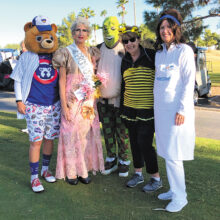 Finalists in Best Halloween Costume Contest (left to right): Ellen Enright (Cubs fan), Winner Nancy Kyle (1949 Prom Queen), Liz Mitchell (Shrek), Sue White (Bumble Bee), Deb Smedley (Progressive Flo).