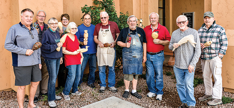 Most of the class with their rattles. Shown are (left to right) Rick Tighe, Paul Bussone, Jeannette McElroy, Kim Bowie, Jane Peacock, Larry Matney (instructor), Roger Borlaug, Dale Sevig, David Linth (instructor), Richard Schlotzhauer, and Bob Stanley. Class members not available for the picture were Cynthia Schwartz, Marianne Moir, and Kathy Stauffer.
