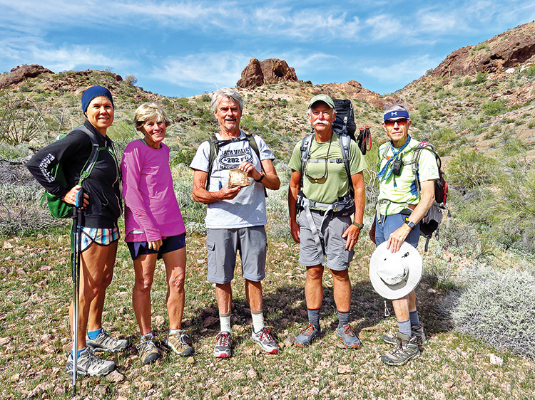 Left to right: Kris Raczkiewicz, Eileen Lords-Mosse, Gary Bray, Dave “Ausy” Ausman, and Lynn Warren (photographer) pause in the north Eagletail with double arches barely visible in the background.