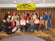 Valley of the Sun Skiers, including Lynn Warren, Jana Cunningham, and Ellie Love from PebbleCreek, gather for a group photo after enjoying a pizza dinner at the end of a great week of skiing in Park City.