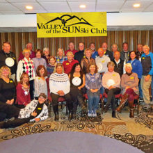 Valley of the Sun Skiers, including Lynn Warren, Jana Cunningham, and Ellie Love from PebbleCreek, gather for a group photo after enjoying a pizza dinner at the end of a great week of skiing in Park City.