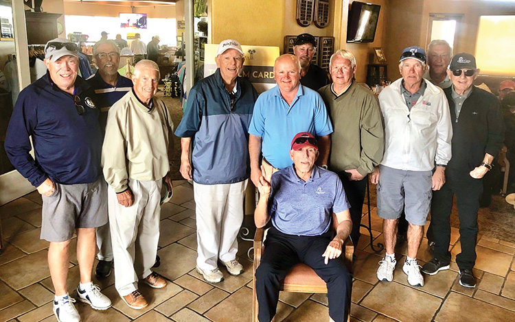 Other club members, shown standing, who helped Dick celebrate are Alan Hatfield, Mark Kloverstrom, Ron Snavely, Lee Ayers, Jerry McFarlane, Bob Sinnard, Charlie Craig, Bruce Dice, Merv Yaskiw, and Bernie Rubin. Seated in front: Dick Hawkins.