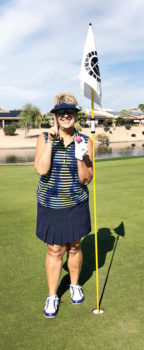 Roberta Ginter makes a hole-in-one.