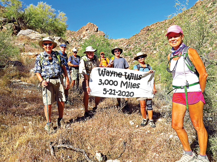 Left to right: Dennis Zigmunt (nice shirt), Lynn Warren (photographer), Dave Schuldt, Jim Gillespie, Tom Wick, Wayne Wills, Caryn Brett, and Kris Raczkiewicz, pausing along the Ford Canyon Trail to celebrate Wayne’s achievement, while practicing social distancing.