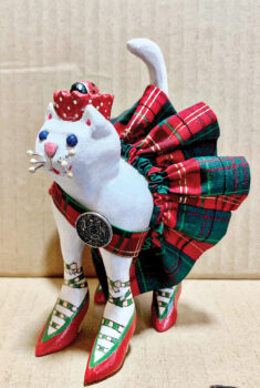 Jeannette McElroy is a cat lover. She carved, painted, and embellished her “Princess Ladybug.”