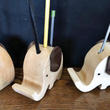 Kathy Stauffer carved a “Herd of Elephant Pencil Holders.”
