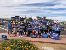 Members of the PebbleCreek Democratic Club at the corner of McDowell and PebbleCreek Parkway after waving campaign signs.