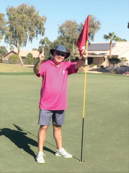 Mike Romano celebrates his hole-in-one.