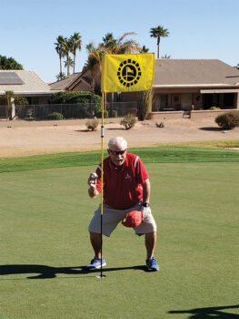 Bob Newell celebrates his third hole-in-one.