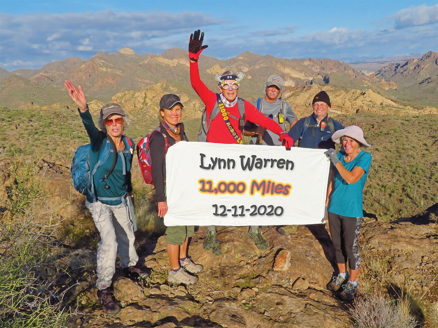 Left to right: Vicki Carter, Kris Raczkiewicz, Lynn Warren (photographer), Steve McElroy, Neal Wring, and Eileen Lords-Mosse celebrating the milestone in Goldfields Mountains’ scenic Willow Springs Canyon.