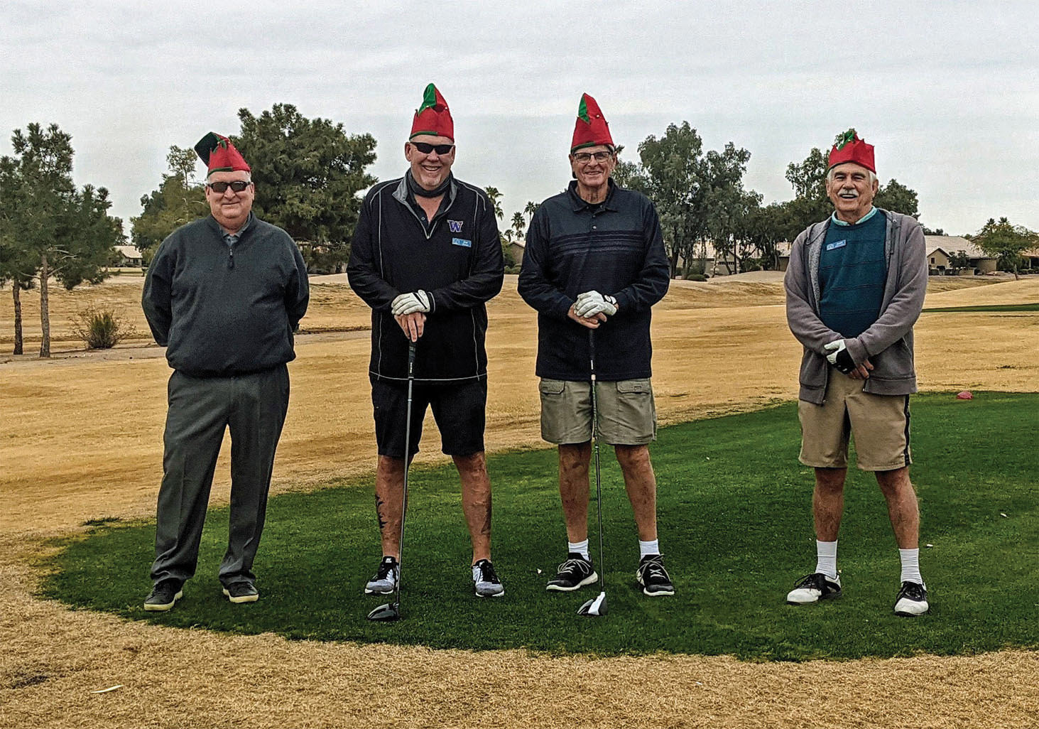 PCM9GA elves leave Santa’s workshop for a quick nine on Christmas Eve (left to right): Mike Brown, “Jingles;” Joe Oliver, “Snowflake;” Fred Schmidt, “Gildor;” and Josh Rabinowitz, “Poldo.”