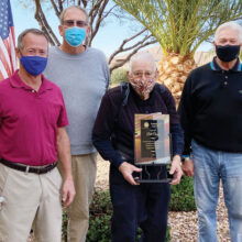 Bill Casey (holding plaque) with PebbleCreek Gun Club officers (left to right) Mitch Counce, Dan Borchers, and Jerry Younker.