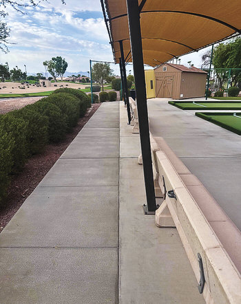 Extra concrete behind the benches for more lawn chair seating